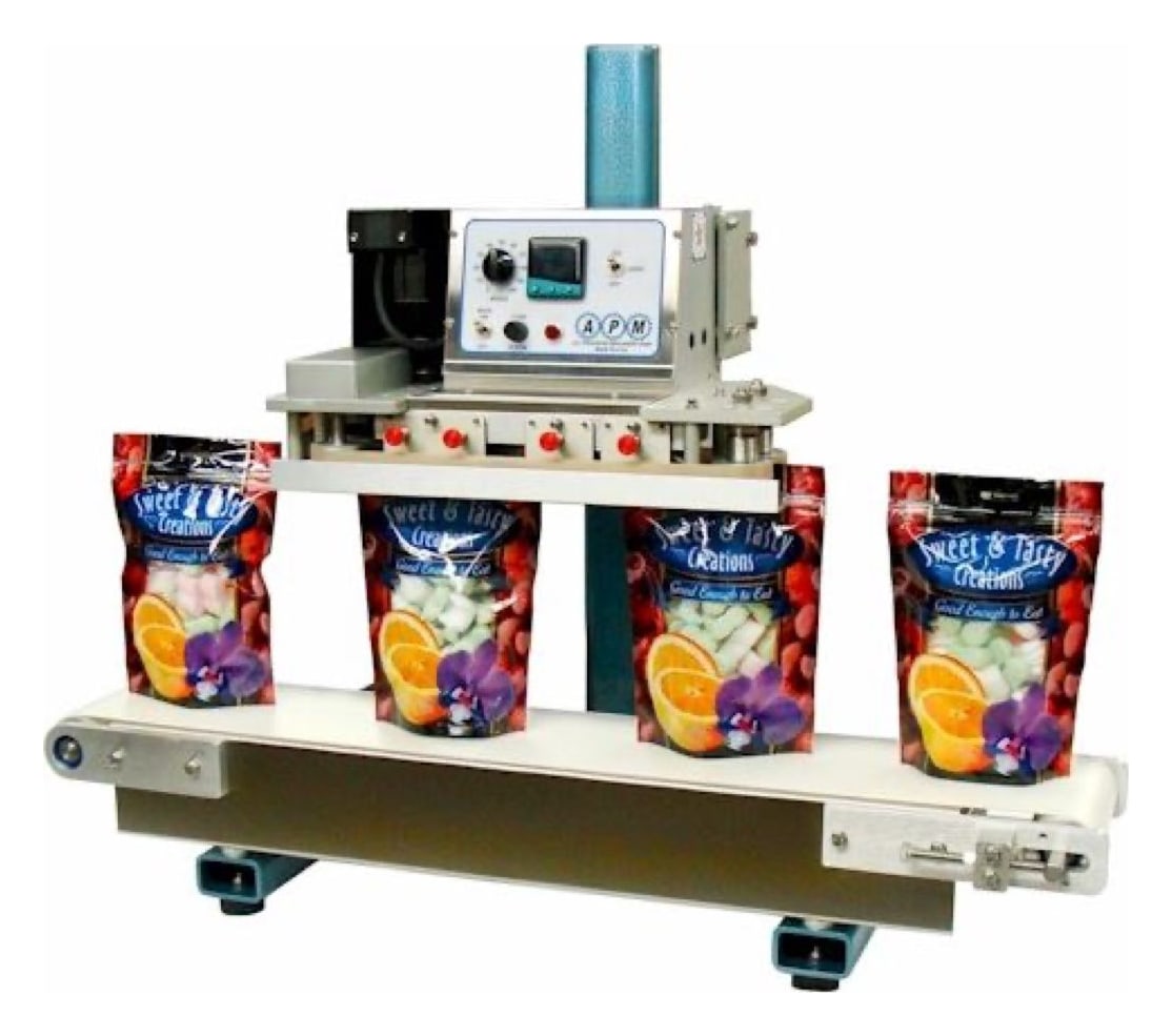 APM tabletop conveyorized band sealer