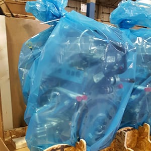 An engine sealed inside a blue Cortec VpCI-126 bag