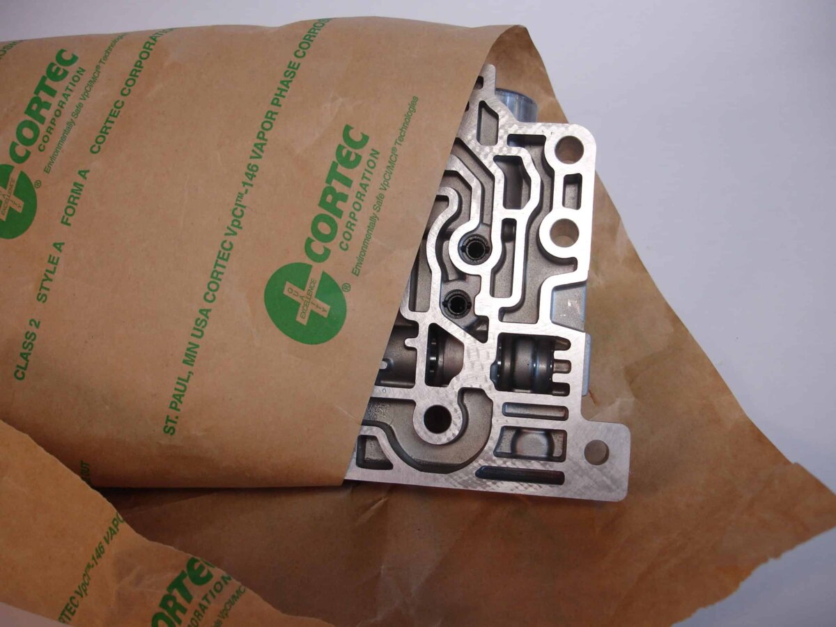 Aluminum part wrapped in Cortec CorShield VpCI-146 paper