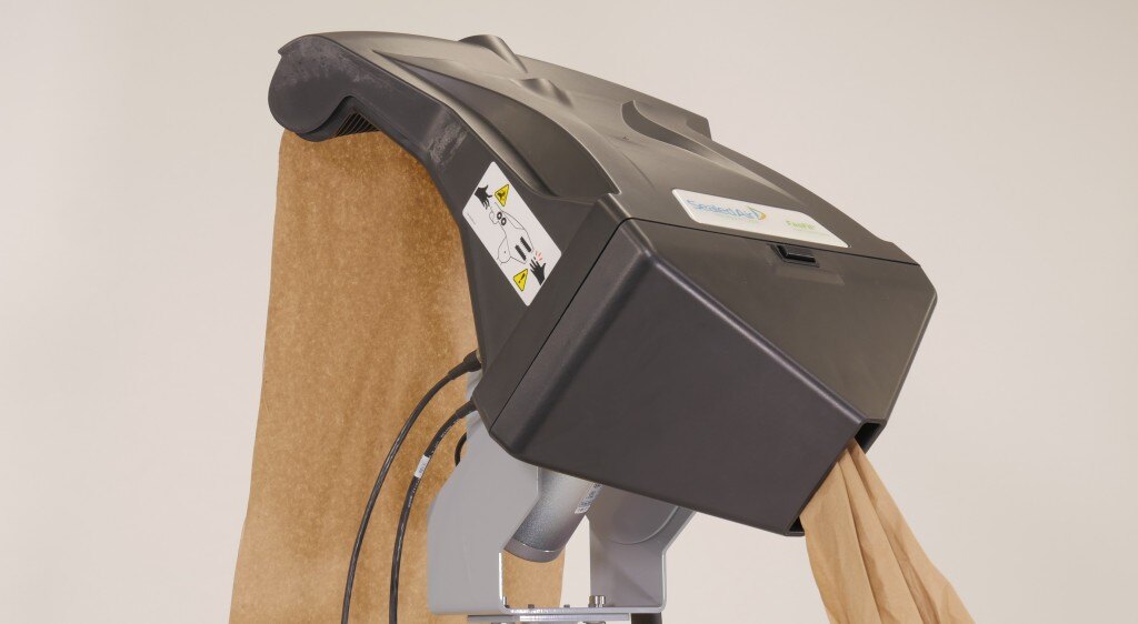 Kraft FasFil paper feeding through the FasFil 1500 dispenser head